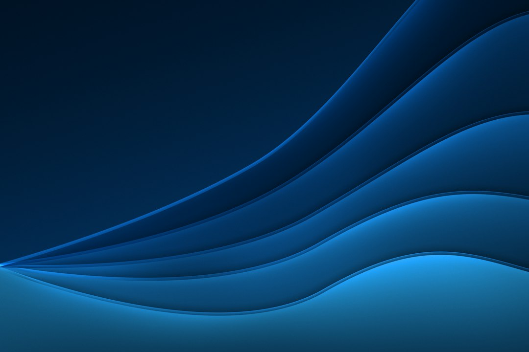 Abstract flowing blue waves representing connected digital communication