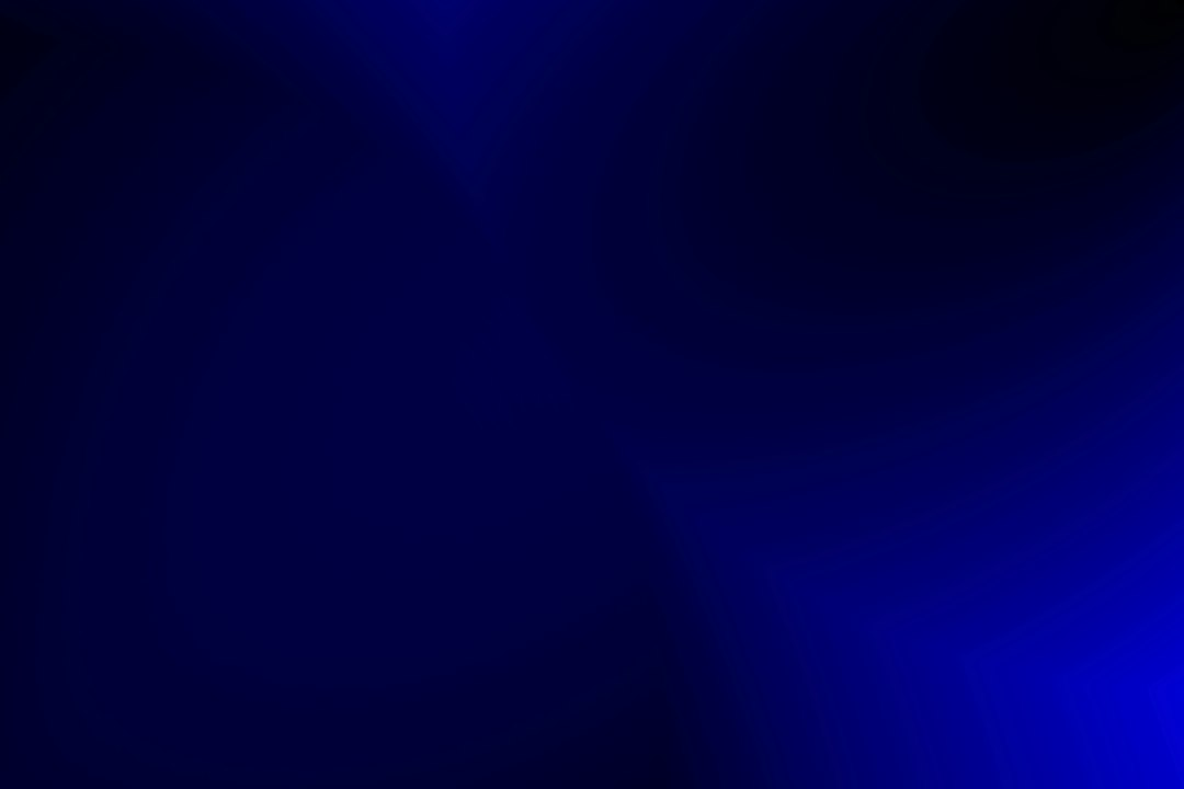 Dark navy and blue abstract gradient representing video discovery and digital content